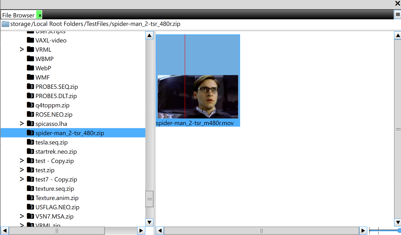Browsing inside a .zip archive: a QuickTime .mov of a Spider-Man 2 trailer, scrubbed to a frame with the red seek line visible
